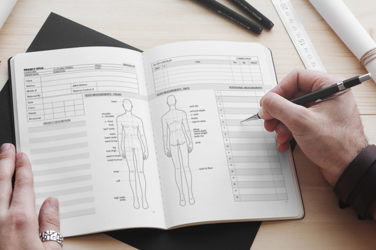 two pages of a sewing business logbook